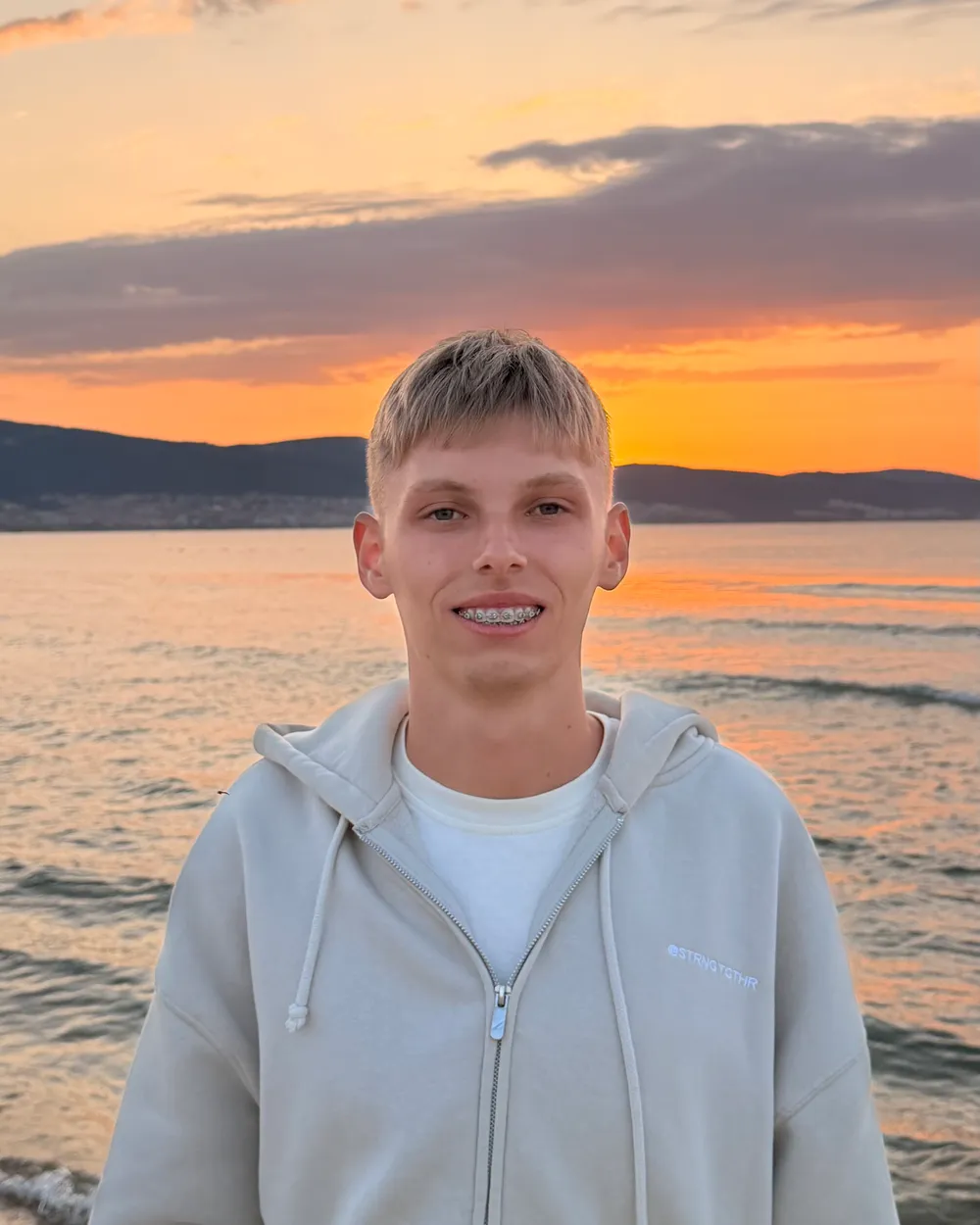 Kiril Karatitsyn at the sea at sunset